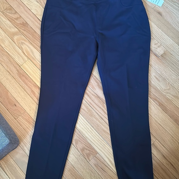St. John's Bay Pants - It’s John’s Bay mid rise, comfort stretch l jegging. Fitted thru hip & thigh